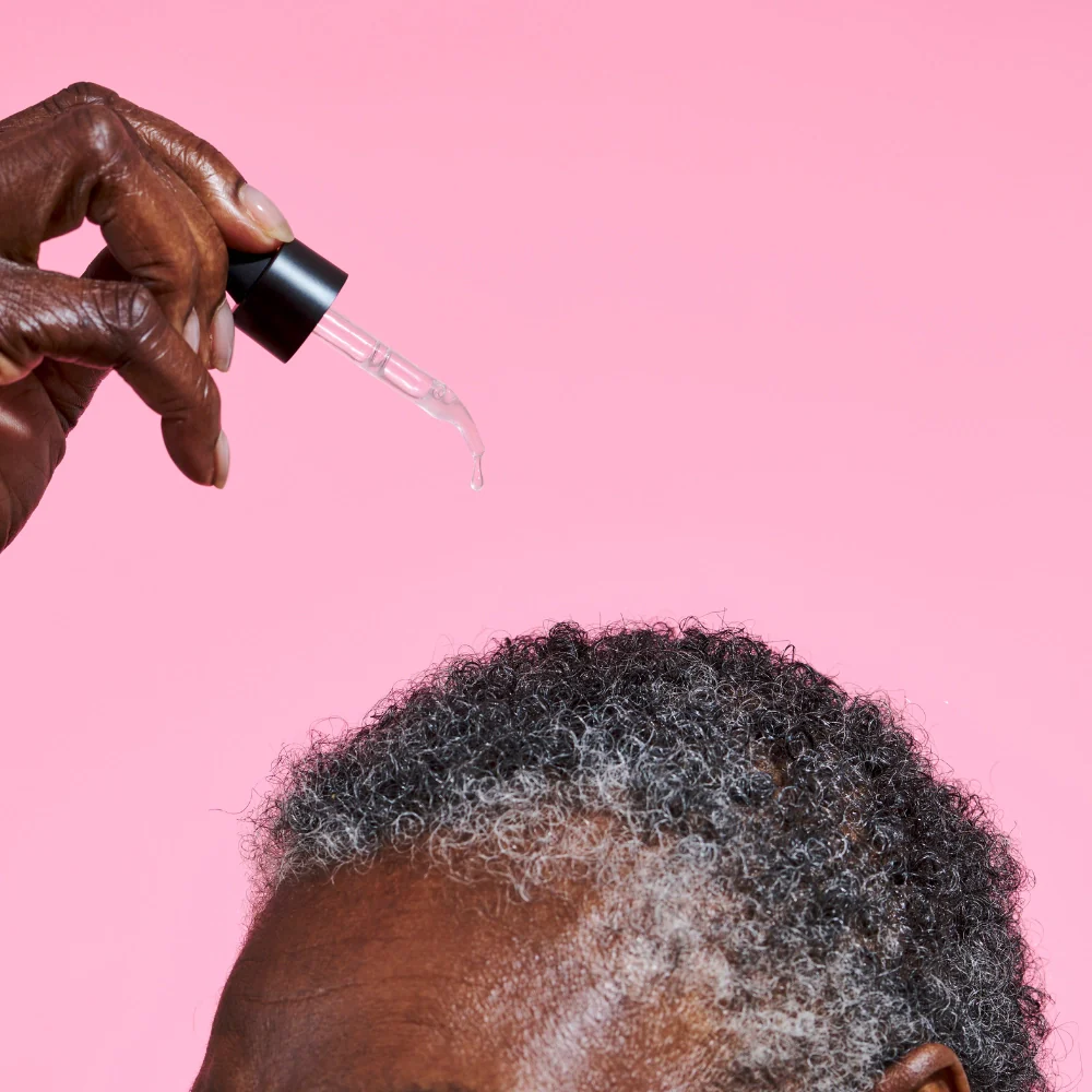 The_Solution_Menopause_Hair_Thickening_Scalp_Serum_Model_Applying_product_2048x2048