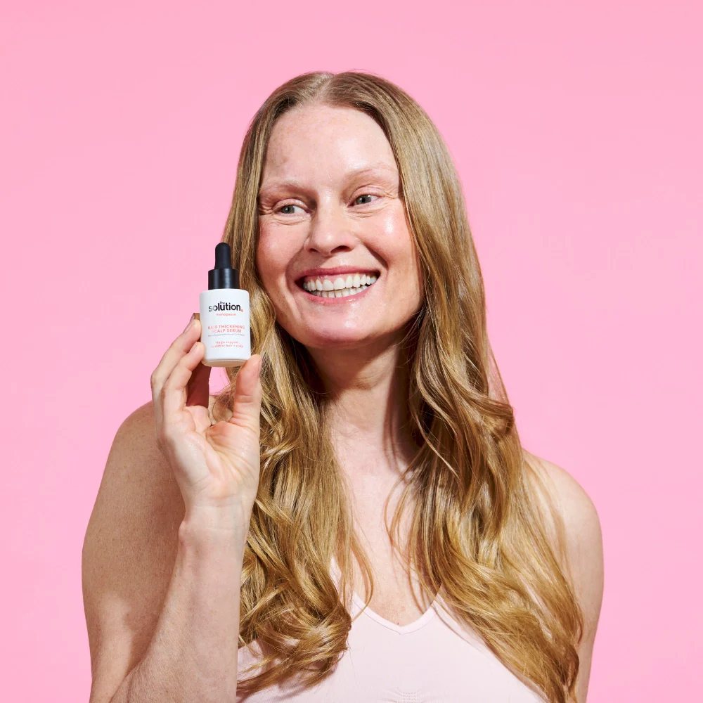 The_Solution_Menopause_Hair_Thickening_Scalp_Serum_Model_Holding_product_2048x2048