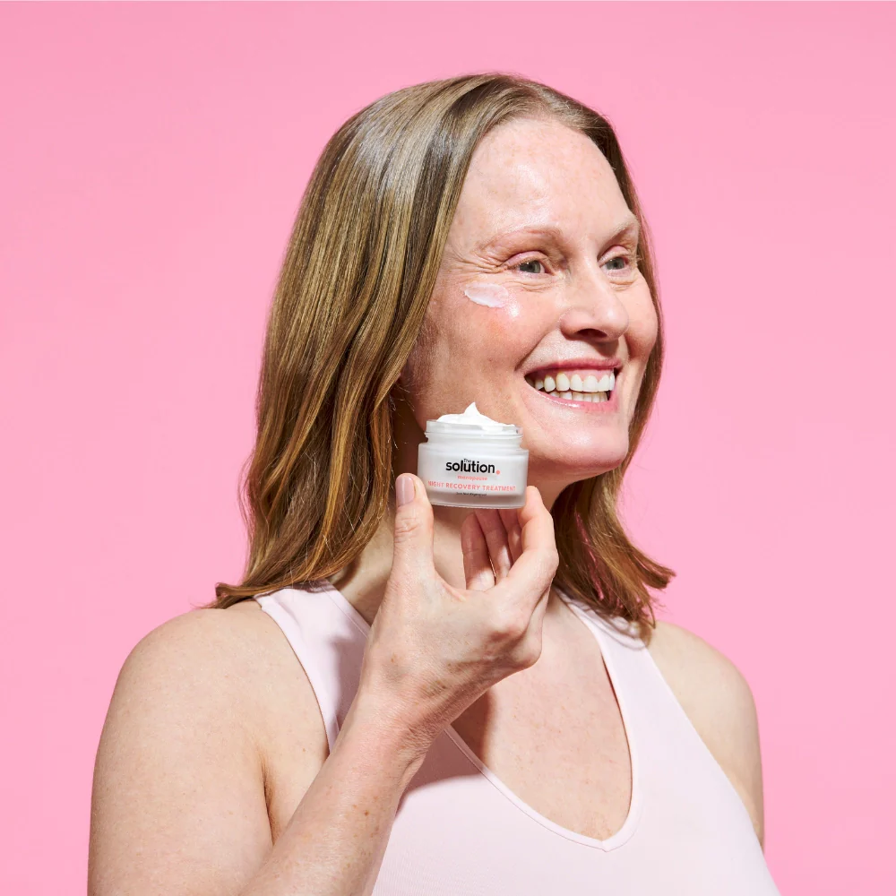 The_Solution_Menopause_Night_Recovery_Treatment_50ml_Model_holding_product_1_2048x2048